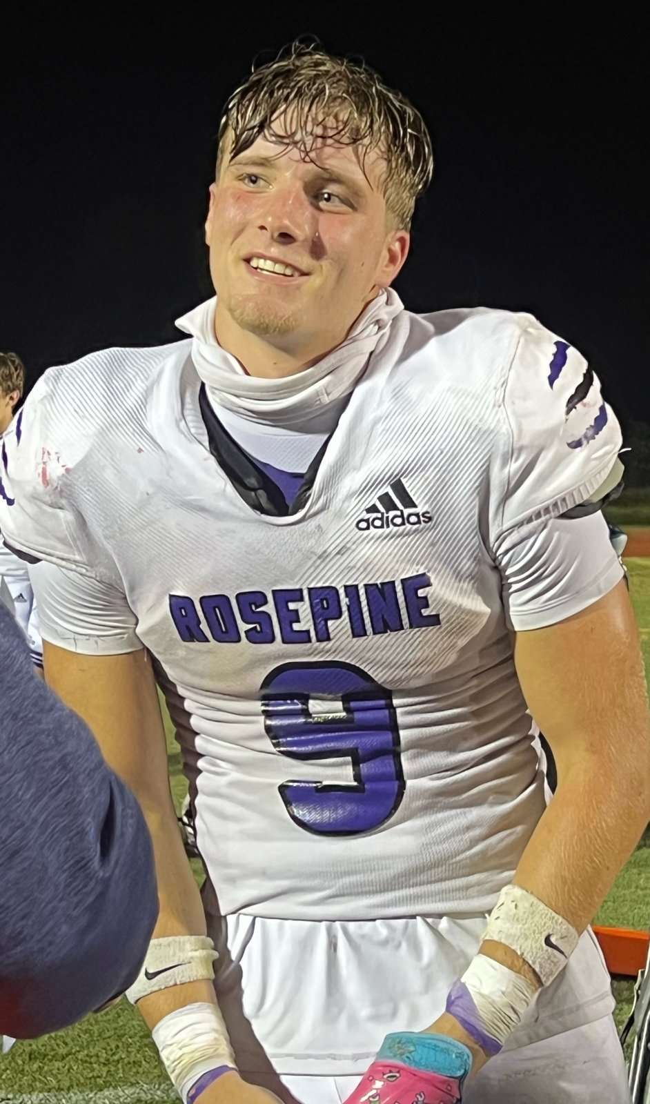 Rosepine senior #9 smiling after the Vinton game